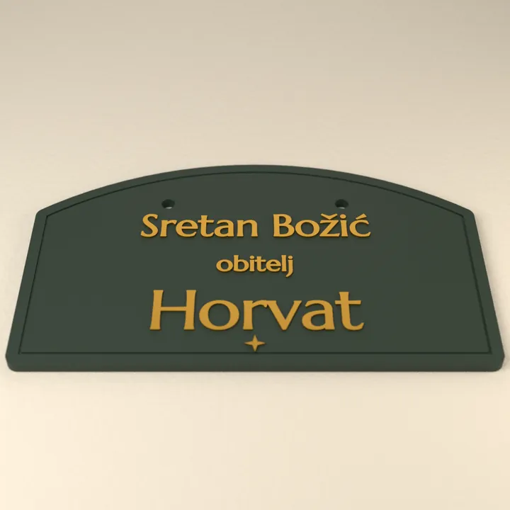 Tamnozelena ploča s natpisom Sretan Božić, obitelj Horvat